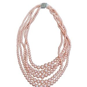 Antique over 80 years, old, pink, five strand pearls with rhinestones clip.